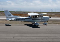 N850SP @ KSQL - 2001 Cessna 172S taxiing - by Steve Nation