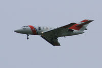 2121 @ AFW - U.S. Coast Guard HU-25A on approach to Allaince Fort Worth ( I shot this from my car driving down the highway ;)  ) - by Zane Adams