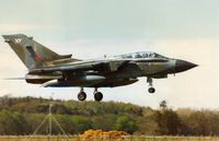 ZA556 @ EGQS - Tornado GR.1 of 15[R] Squadron landing on Runway 05 at Lossiemouth in April 1996. - by Peter Nicholson