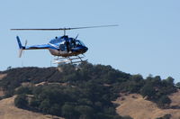 N10KX @ 1O2 - 1975 Bell 206B on approach to Lampson Field (no longer dusting) - by Steve Nation