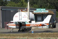 N68472 @ 1O2 - Christiansen Aviation 1978 Cessna 152 gassing up at self serve POL line @ Lampson Field - by Steve Nation