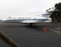 N100LA @ KOAK - Racine, WI-based 1995 Raytheon Corporate Jets Inc HAWKER 800XP visiting North Field @ KOAK (why didn't I use my Powershot 710 with fence busting smaller lense? Note to Steve - duh!). - by Steve Nation