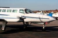 D-IAAZ @ EGGP - Cessna 404 Titan Courier 2 - by Chris Hall