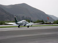 N1815L @ SZP - 1976 Beech 58P BARON, two Continental TSIO-520-LB1C 310 Hp each, air from turbosuperchargers pressurizes cabin to 3.6 psi differential. Landing roll Rwy 22 - by Doug Robertson