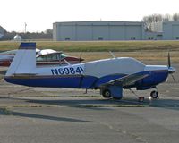 N6984V @ TTN - These old Mooney aircraft hold their age very well.  This beauty dates back to 1976.  If only I could "undress" her and remove that tarp.  She is seen at Trenton - Mercer County Airport (TTN). - by Daniel L. Berek