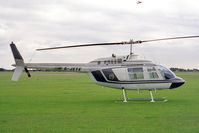 G-JETX @ EGTC - Bell 206B. At Cranfield Airfield, Beds, UK in 1988. - by Malcolm Clarke