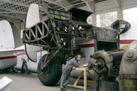 G-ANTK @ EGSU - Avro 685 York C1. Under renovation at the Imperial War Museum, Duxford in 1986. - by Malcolm Clarke