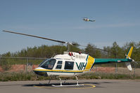 C-GNMT @ CYXJ - VIH Bell 206 - by Andy Graf-VAP