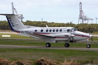 VH-FDB @ BNE - Royal Flying Doctor taxiing in Brisbane - by rkc62