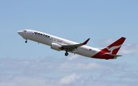 VH-VXD @ BNE - Qantas 738 Tenterfield with gear down - by rkc62