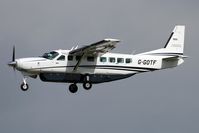G-GOTF @ EGNT - Cessna 208B Grand Caravan on approach to rwy 25 at Newcastle Airport, UK. - by Malcolm Clarke