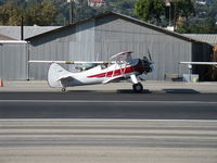 N32135 @ SZP - 1941 Waco UPF-7, Continental W670 220 Hp, a stunning showplane, taxi to Rwy 22 - by Doug Robertson