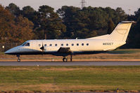 N650CT @ ORF - Charter Air Transport, Inc 1990 Embraer EMB-120ER Brasilia N650CT (FLT SRY650 - Stingray 650) rolling out on RWY 5 after arrival from Atlantic City Int'l (KACY) in nice evening light. - by Dean Heald