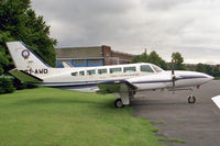 ST-AWD @ EGTC - Cessna 404 Titan ll at Cranfield Airport, UK in 1988. - by Malcolm Clarke
