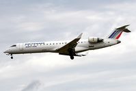 F-GRZE @ EGNT - Canadair CL-600-2C10 Regional Jet CRJ-702 on approach to rwy 25 at Newcastle Airport, UK. - by Malcolm Clarke