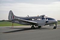 VP981 @ EGXW - De Havilland DH-104 Devon C2. From The Battle of Britain Memorial Flight stationed at RAF Coningsby and seen at RAF Waddington Photocall 1990 - by Malcolm Clarke