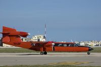 YJ-LGF @ LMML - Red Trislander - by airphoto