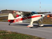 N8714D @ TDZ - Arriving at the EAA breakfast fly-in - Toledo, Ohio. - by Bob Simmermon