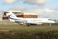ZS-DTD @ EGGW - South African Hawker 4000 leaving Luton bound for Lagos - by Terry Fletcher