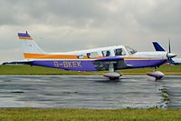 G-BKEK @ EGBP - Piper PA-32-300 Cherokee Six [32-7540091] Kemble~G 10/07/2004. Seen at the PFA Fly in 2004 Kemble UK. Has since become G-FAVS. Taken in pouring rain. - by Ray Barber