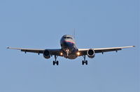 N819UA @ KORD - United Airlines A319-131, UAL487 arriving from KPHL, short final 27L KORD. - by Mark Kalfas