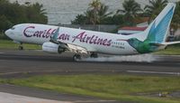 9Y-GEO @ TNCM - Caribbean airlines 737 landing at TNCM - by Daniel Jef