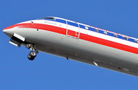 N519AE @ KORD - American Eagle CRJ700 N519AE arriving Runway 19 - by Mark Kalfas