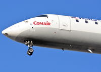 N784CA @ KORD - Comair CL-600-2B19, COM1574 arriving 27L from KCVG. - by Mark Kalfas