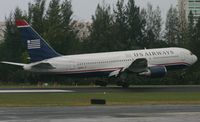 N246AY @ TJSJ - US Airways main landing gear down at tjsj - by Daniel Jef