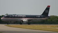 N114UW @ MDSD - US airway off the taxi way to the ramp - by Daniel Jef
