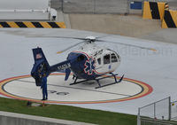 N142LN @ 61FL - 12/5/09 This helicopter was trying to depart, but after several attempts to lift off, the pilot touched back down. That's when I saw the back vibrating very hard. I believe that called ground resonance. - by JasonAdler.com