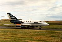N902FR @ EGQS - Falcon 20DC of FR Aviation with ECM jamming pods taxying out for another mission at Lossiemouth in September 1991. - by Peter Nicholson