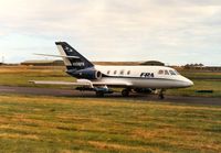 N906FR @ EGQS - Falcon 20DC of FRA taxying out to the active runway at Lossiemouth in September 1991. - by Peter Nicholson