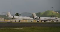 N508QS @ TNCM - Two great birds park side by side at the C ramp - by Daniel Jef