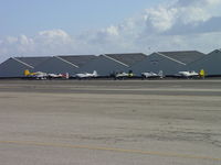 N157GS @ CCB - Parked in order, L to R, N157GS, N655RV, N628PV, N434DR, N61ED - by Helicopterfriend