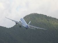 F-ORLY @ TNCM - Air caraibes clearing the hills on the way out of St Maarten - by Daniel Jef