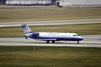 N403SW @ KPIA - United Express (N403SW) departure roll - by Thomas D Dittmer