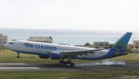 F-OFDF @ TNCM - Air caraibes A330-200 landing at TNCM - by SHEEP GANG