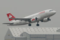 HB-IPV @ EGCC - Climbing away from Runway 05L on a grey Manchester morning. - by MikeP