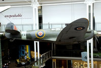 R6915 @ LONDON - This Spitfire is suspending from the roof of the main entrance hall of the Imperial War Museum. - by Joop de Groot