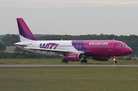 HA-LPW @ EGCC - Wizz Hour at Luton with the first of a stream of departures. - by MikeP