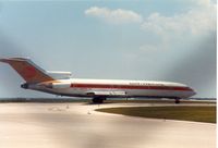 N66726 @ MCO - Continental Airlines Boeing 727 taxying to the active runway at Orlando in May 1988. - by Peter Nicholson