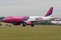 HA-LPJ @ EGCC - Wizz Hour at Luton with a stream of departures. - by MikeP