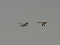 N110AS @ CCB - Waco on the left making a formation pass with a Bellanca Scout N625AP - by Helicopterfriend
