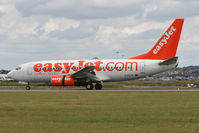 G-EZJC @ EGGW - Braking after touchdown on Runway 26. - by MikeP