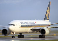 9V-SVA @ EGCC - Singapore '777 departing MAN RW23L. - by vickersfour