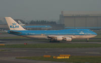 PH-BFG @ EHAM - Lining up for departure under the last light of day. - by MikeP