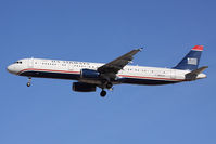 N507AY @ LAS - US Airways N507AY (FLT AWE391) from Charlotte/Douglas Int'l (KCLT) on final approach to RWY 25L. - by Dean Heald
