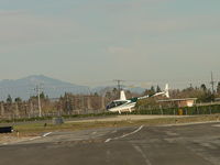 N144WB @ POC - Air taxiing to runway 26L for take off - by Helicopterfriend