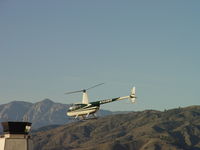 N144WB @ POC - Lifting up, proceeding westbound, and getting ready to pass the Tower - by Helicopterfriend